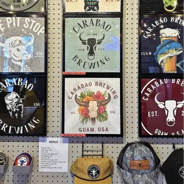 The merch wall of Carabao and Pit Stop shirts and hats (Instagram, opens in a new tab)